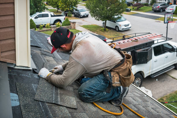 Professional Roof Replacement technician working in Owego, NY